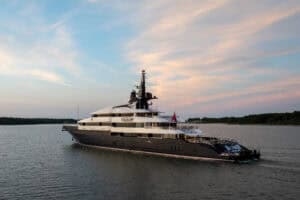 Super yacht cruising at sunset MY Man of steel