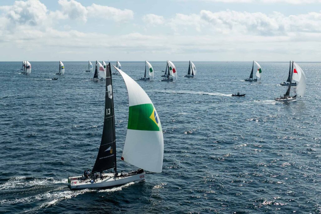 Racing yacht with Brazilian spinnaker in rolex Newport ri