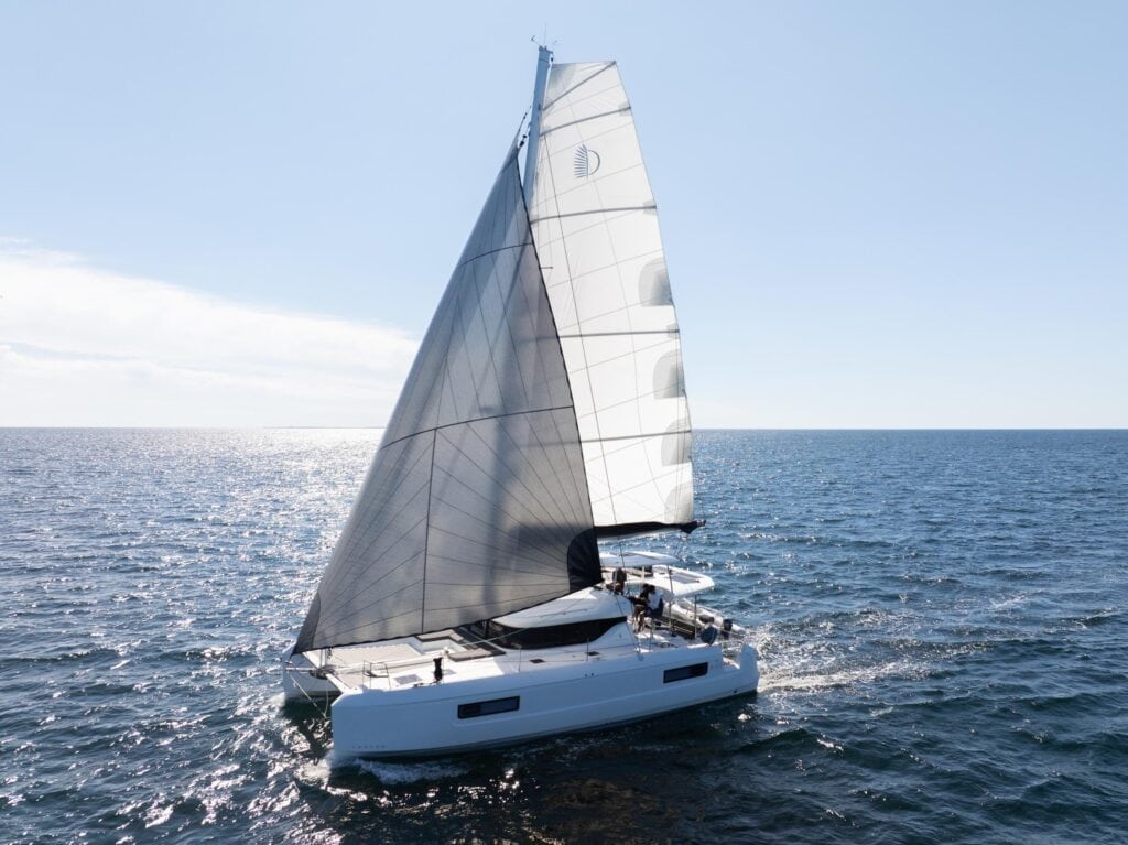 Lagoon catamaran under full sail off Newport, Rhode Island