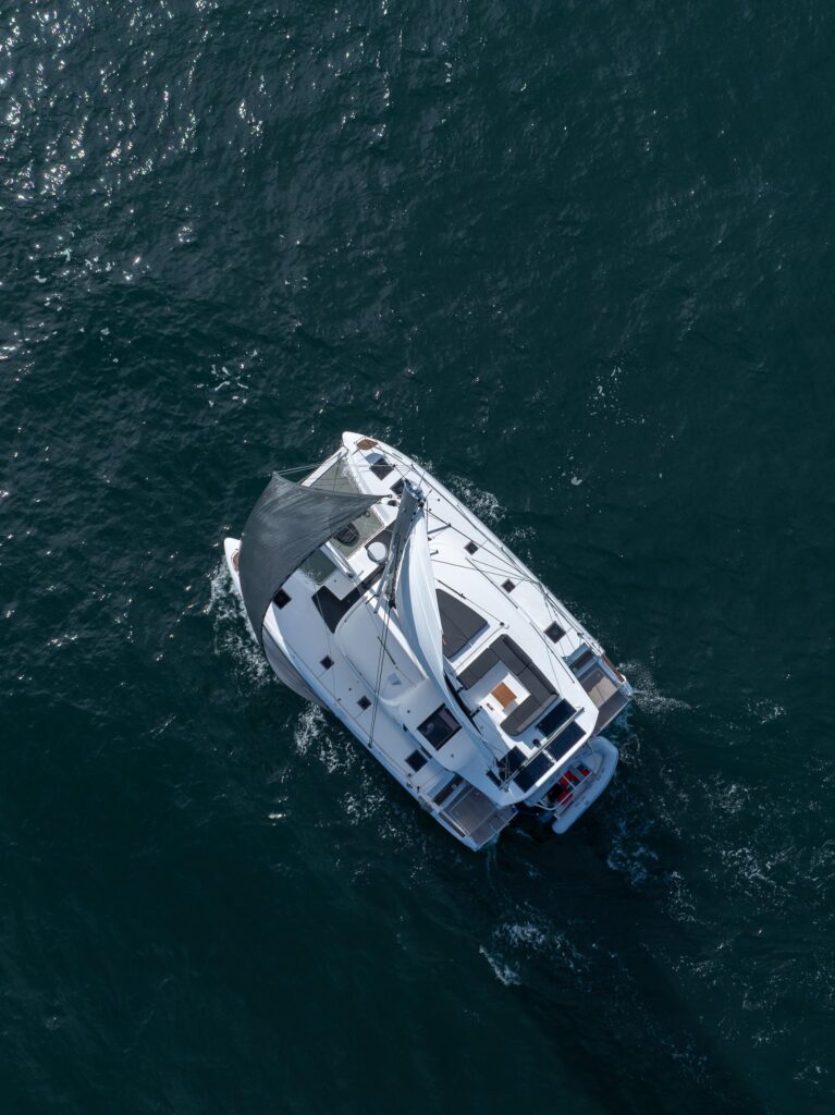 Overhead drone view of a Lagoon 43 catamaran under way
