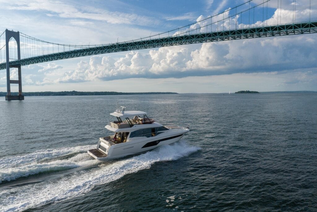 Motor yacht At Eaze under way beneath the Newport Bridge, Rhode Island