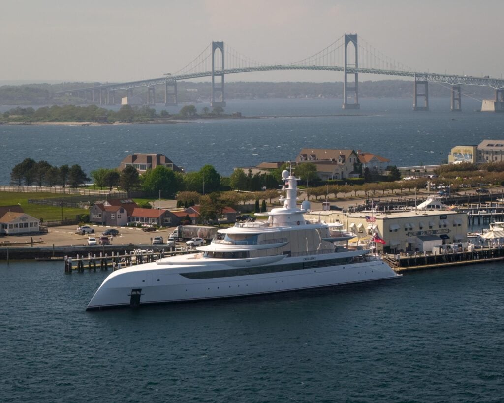 Superyacht alongside in Newport Harbour with the Newport Bridge behind