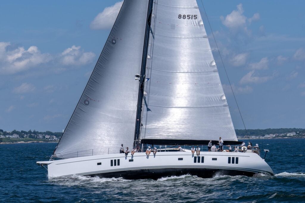 Sailing yacht under full sail on race day off Newport, Rhode Island