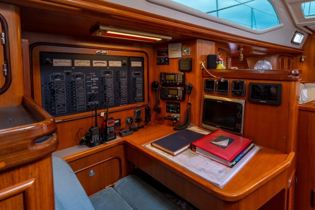 Navigation station with instruments and chart table aboard the sailing yacht Rubycon
